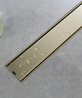 Caniveau de douche encastré or brossé