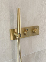 Colonne de douche encastrée or brossé