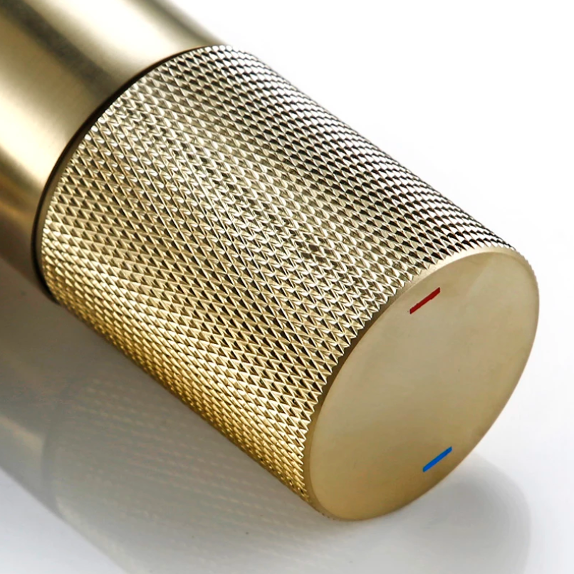 Mitigeur de lavabo or brossé