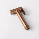 Douchette hygiénique or rose brossé