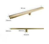 Caniveau de douche encastré or brossé