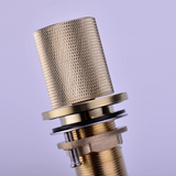 Robinet de salle de bain or brossé